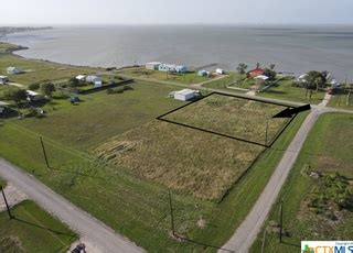 alamo beach lots for sale.